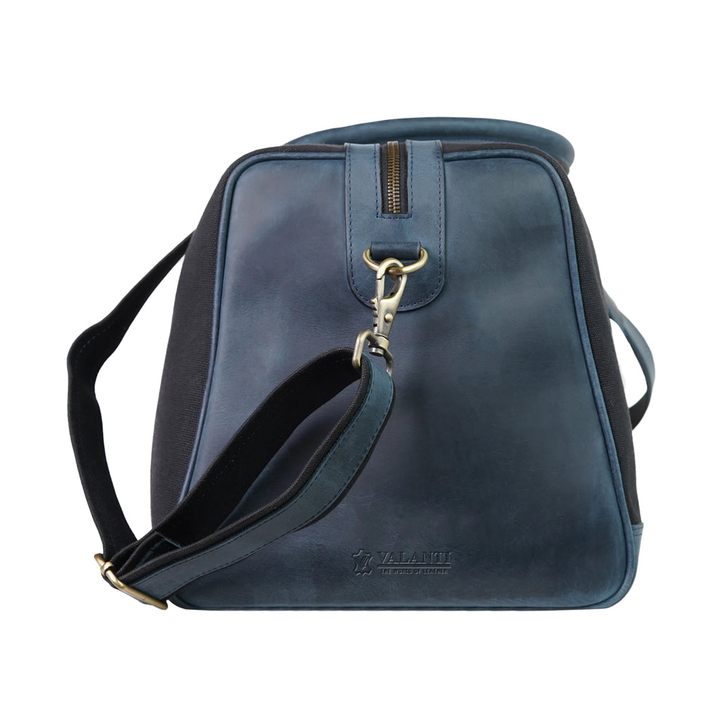 Side view of VALANTI navy blue canvas travel duffle bag