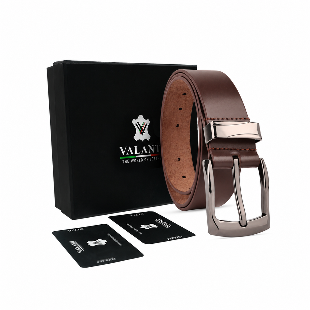 The Men’s Leather Dress Belt – Silver Buckle is shown in front of a black Valante box and two black cards, all set against a white background.