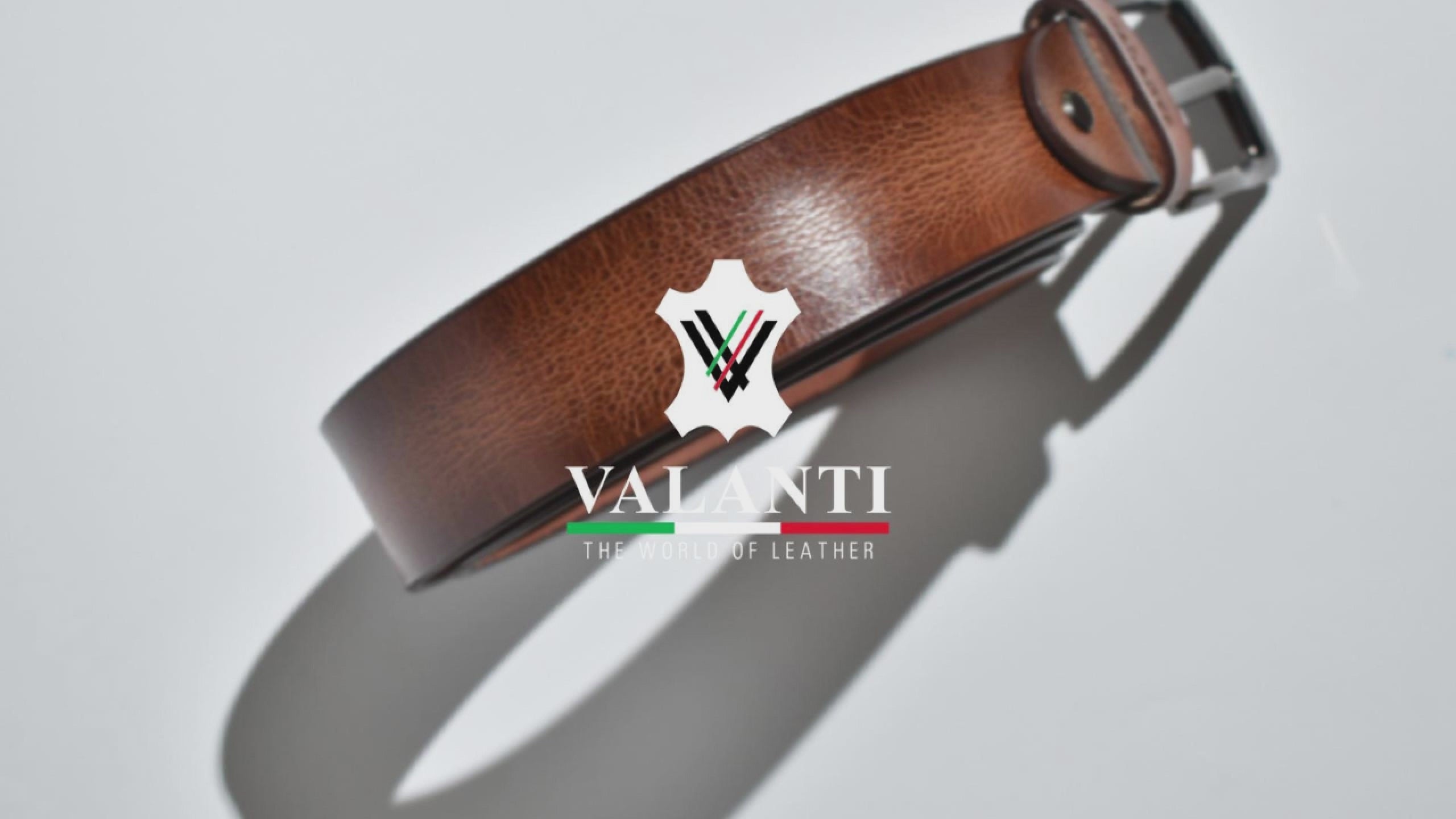 Promotional video of premium full-grain brown & black leather belts on a white background